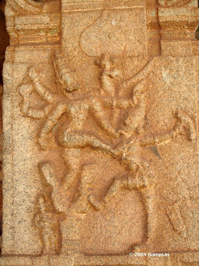 Watching by the side of the fearsome Narasimha is Prahlada .Image from Vittala Temple