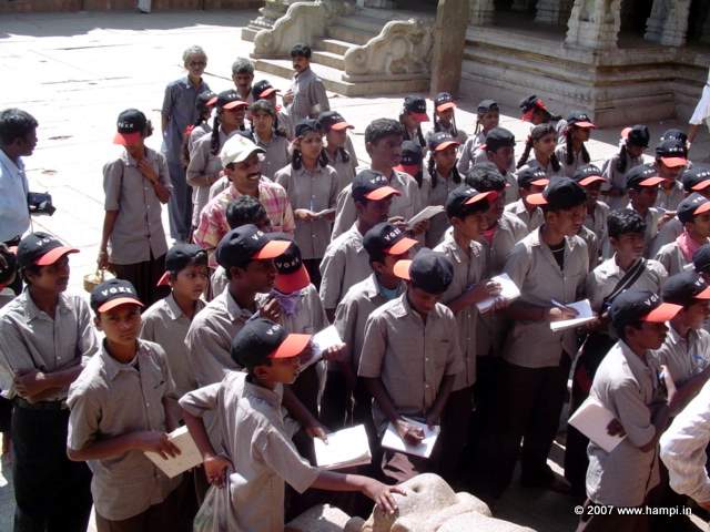 A batch of school students at Virupaksha Temple