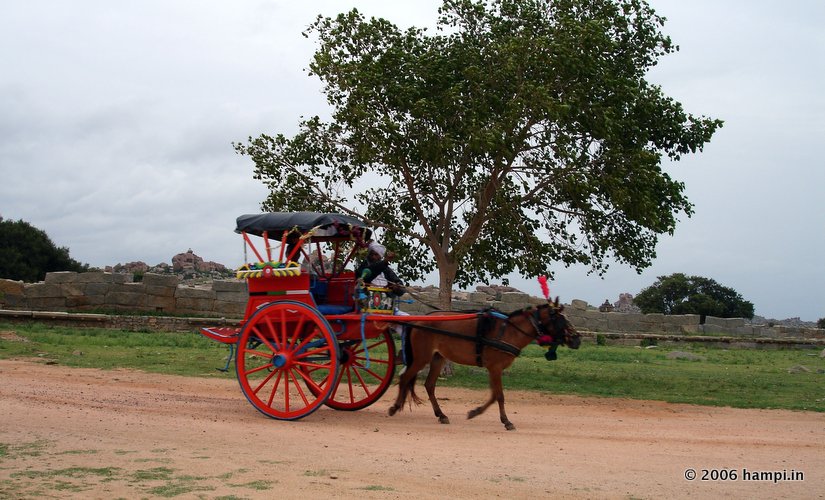 Tonga (pony cart) is a popular way to travel between the Hampi Bazaar - Royal Center - Vittala Temple route. 