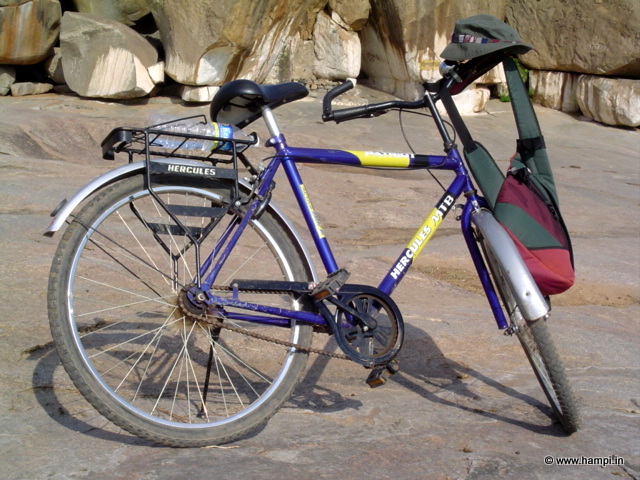 Rent a bicycle at Hampi. They are  fun and cheaper efficient way to explore this large ruins site.