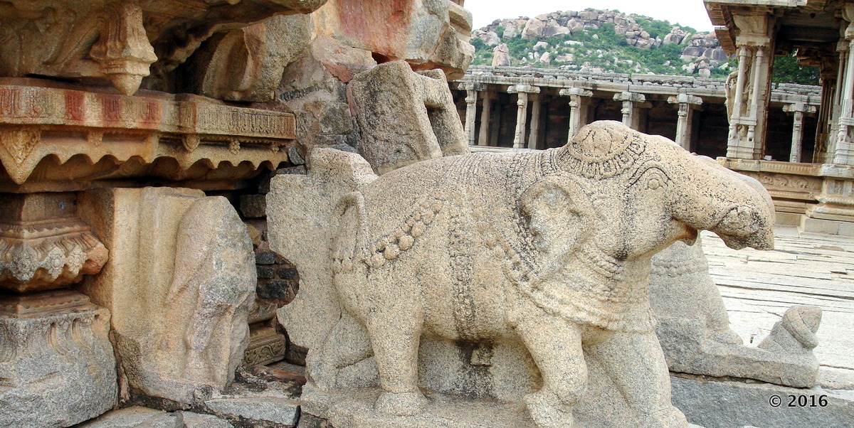 The two elephants that appear in front of the chariot as if they are pulling it, do not belong this structure. The elephants where brought from else where and kept in front of the Chariot. Originally it was two horses, that was part of the Stone chariot. You can still see the hind legs and tail of the horse sculpture. 