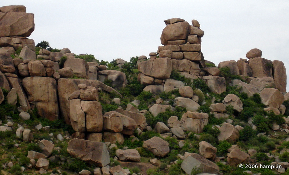 Balancing boulders atop the Malyavanta Hills in Hampi