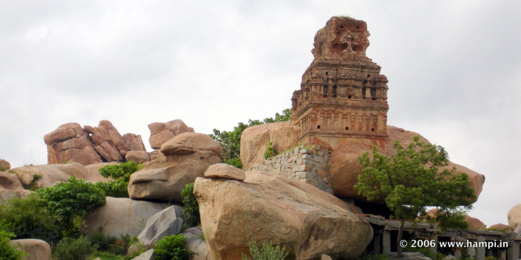 This shrine is located on the way from Kamalapura to Vittala Temple.  Look around the first series of Boulder hills that will appear on your LEFT,  after you've entered the Vittala Temple road from the Kampili bound main Road. 