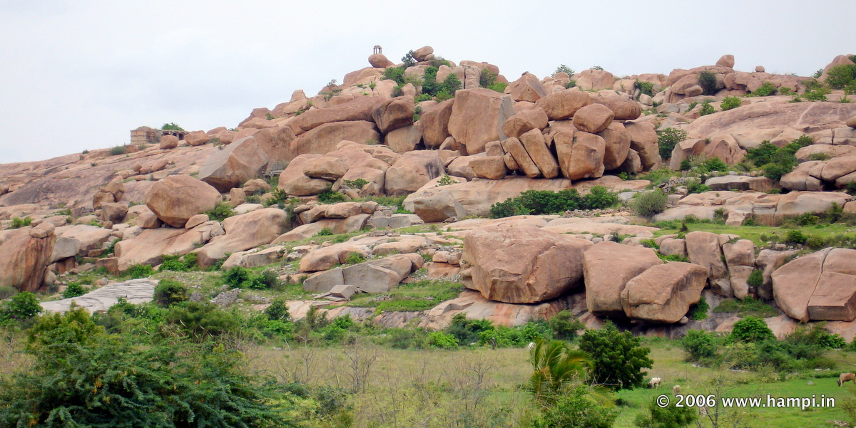 Note the tiny watchtower pavilion atop the boulder hills. Hampi has many such watchtowers, many can be reached with a tedious trek. 