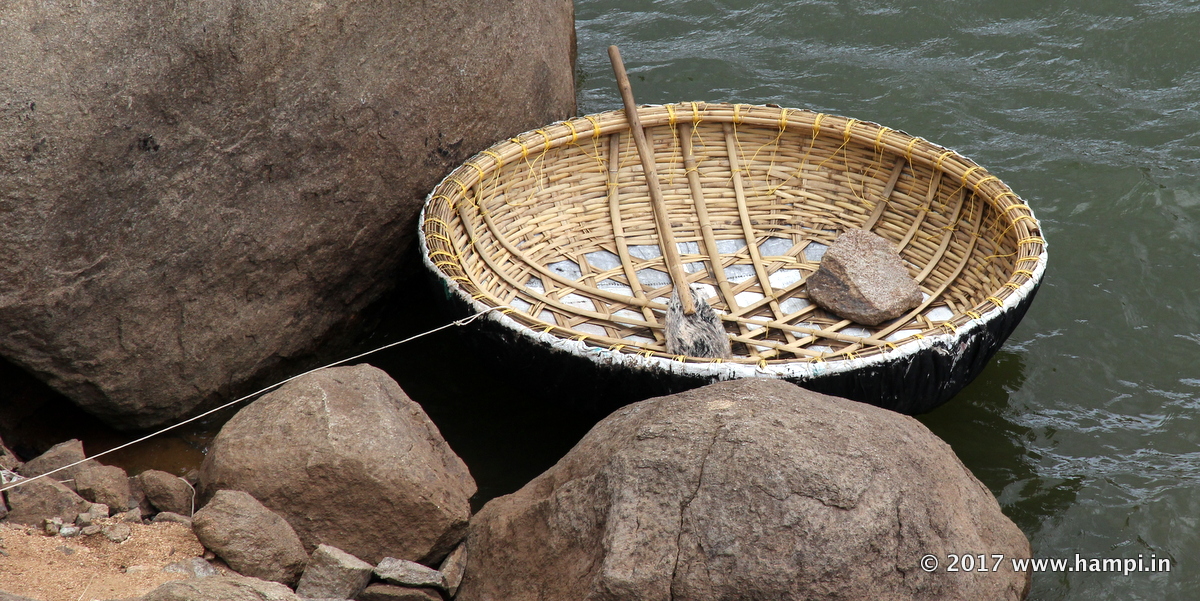 Coracle in Hampi. Note the stone kept for counter weight.